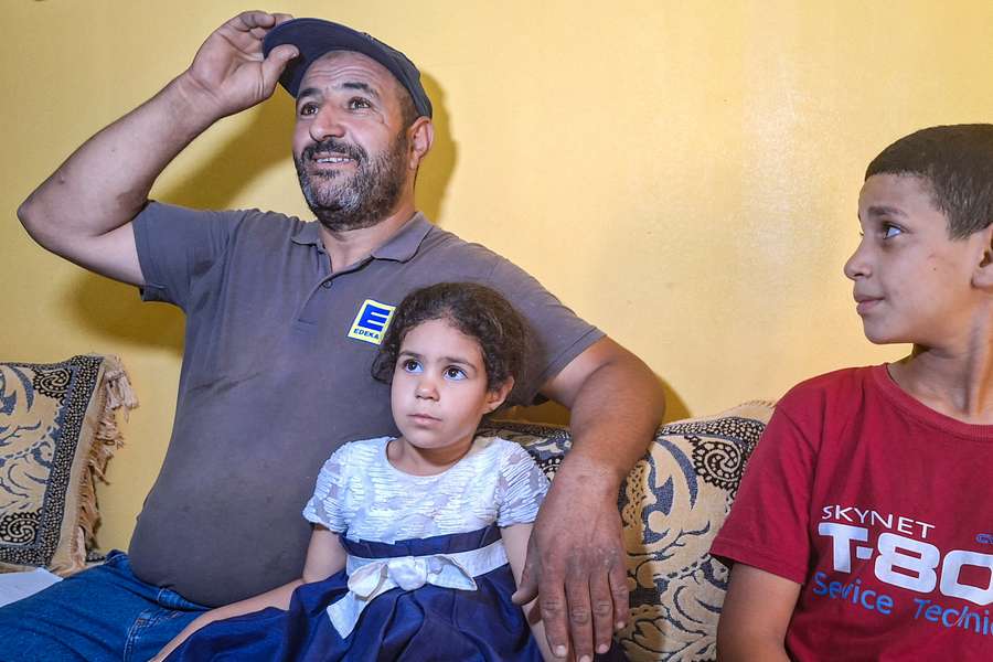 Omar Khelif, father of Imane, with the boxer's young siblings