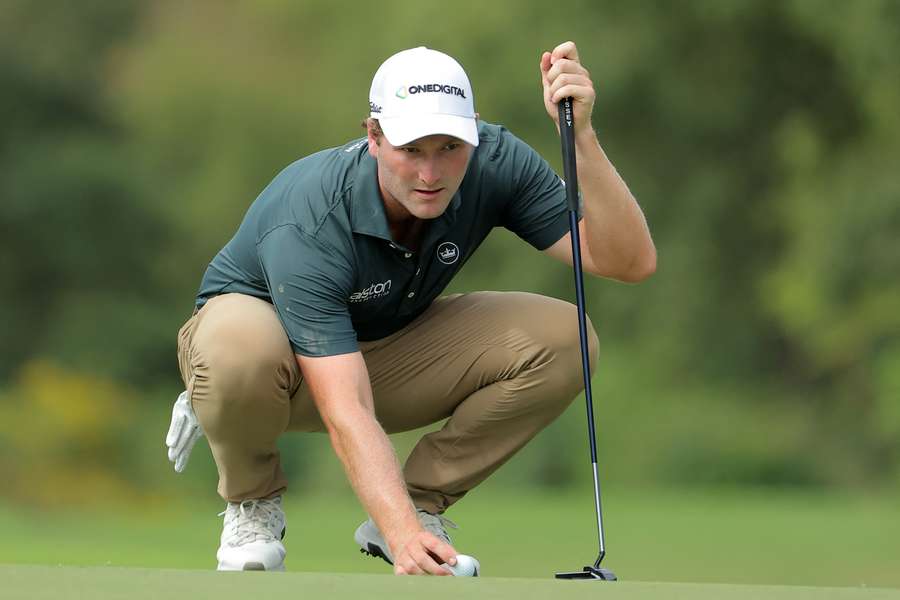 Vince Whaley lines up a putt at the 12th green on Sunday. 