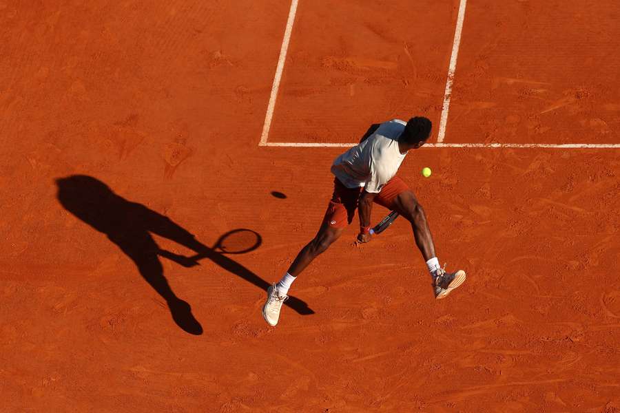 Gaël Monfils hits a tweener in the Monte Carlo Masters match against Tallon Griekspoor