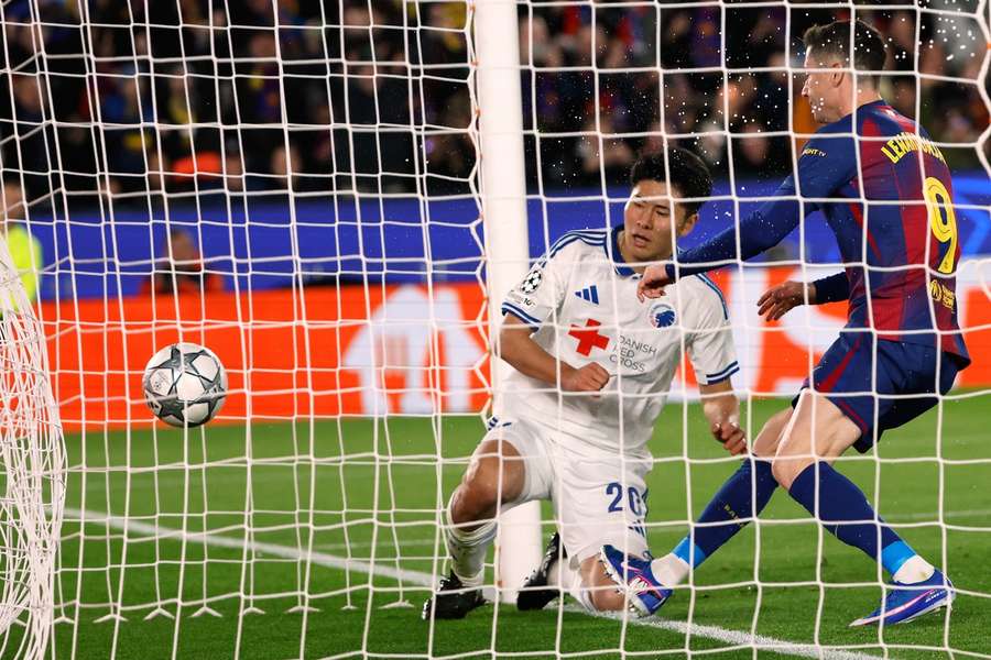 Barcelona's Robert Lewandowski scores his side's first goal during the Champions League clash against FC Copenhagen