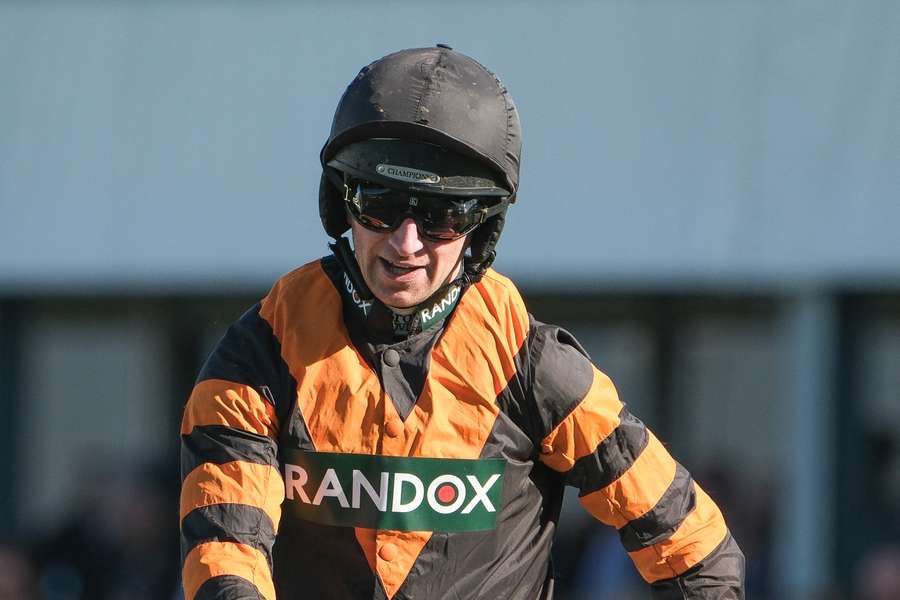 Patrick Mullins won the Grand National on a horse trained by his father
