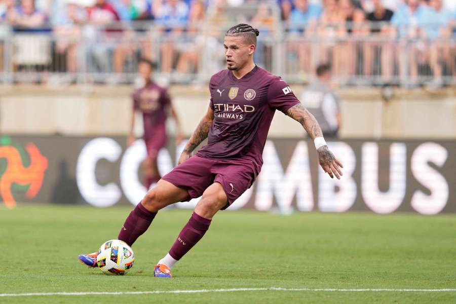 Phillips in action for Man City