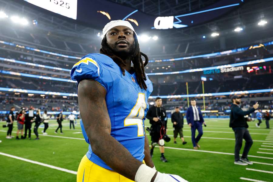 Gus Edwards leaving the field after a Chargers victory over the Denver Broncos