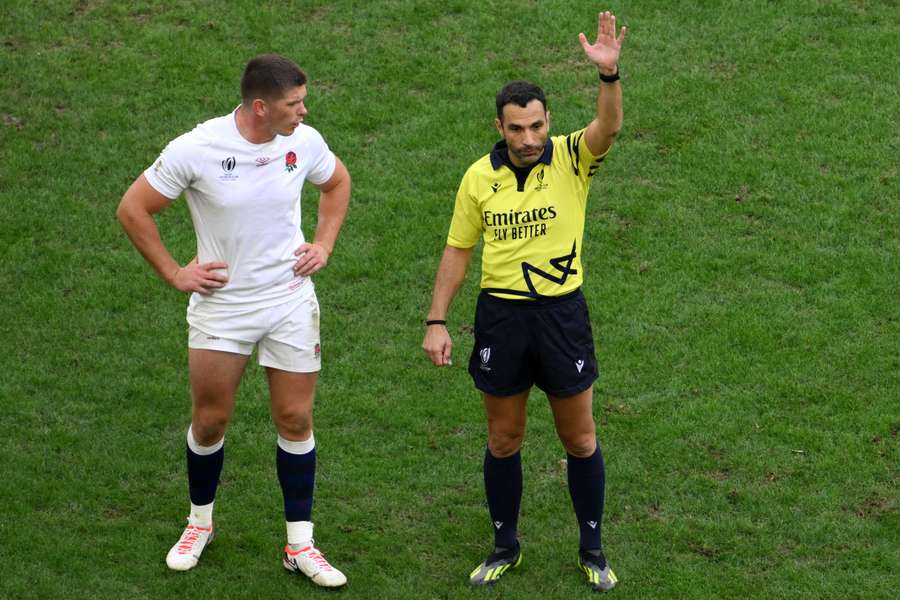 Mathieu Raynal (R) refereed the 2023 Rugby World Cup quarter-final between England and Fiji