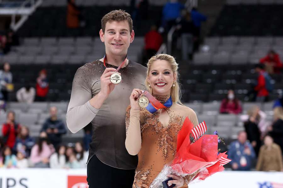 Frazier (L) and Knierim pose with their medals