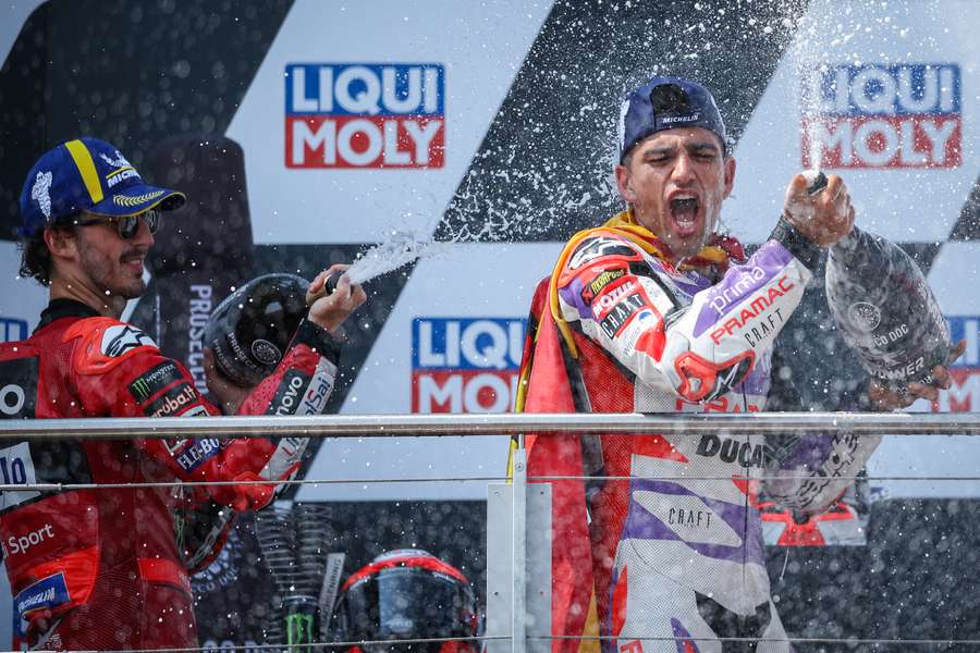 Pramac Racing rider Jorge Martin (R) and second-placed Ducati Lenovo rider Francesco Bagnaia celebrate on the podium