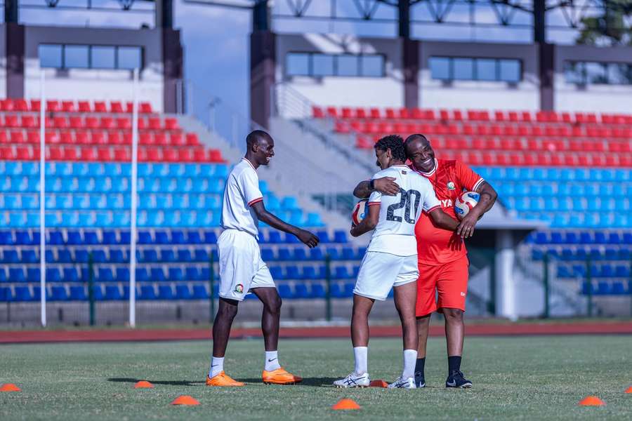 McCarthy with Kenya players McCarthy with Kenya players