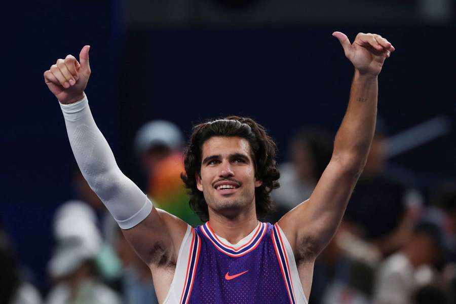 Alcaraz salutes the crowd after his victory Alcaraz salutes the crowd after his victory
