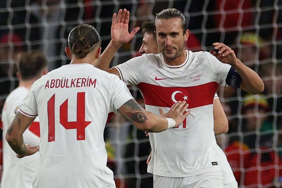 Yusuf Yazici celebrates his equalising goal for Turkey