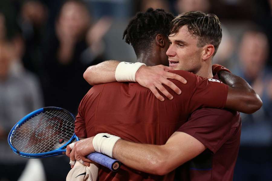 Monfils and Draper embrace after their match