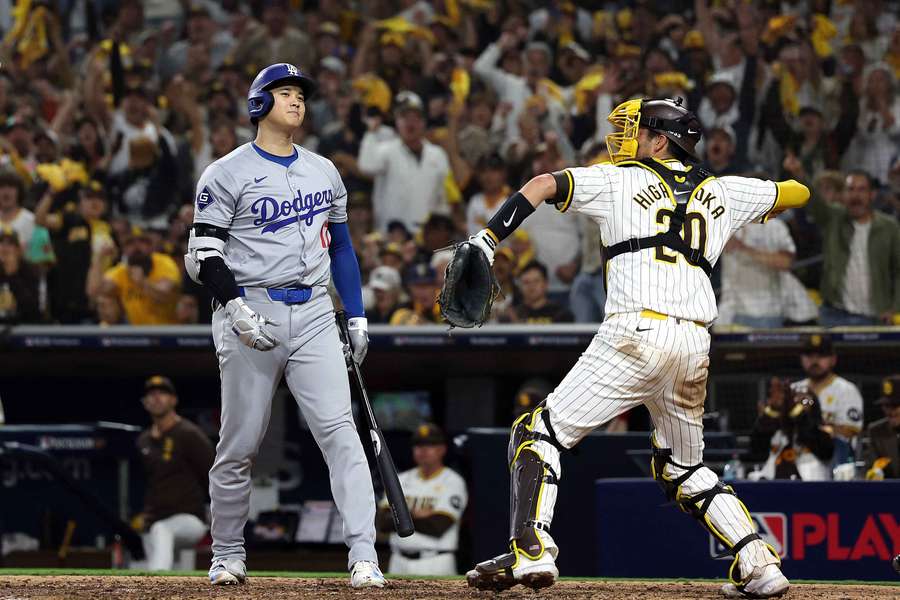 Shohei Ohtani (left) strikes out in the eighth inning against the San Diego Padres