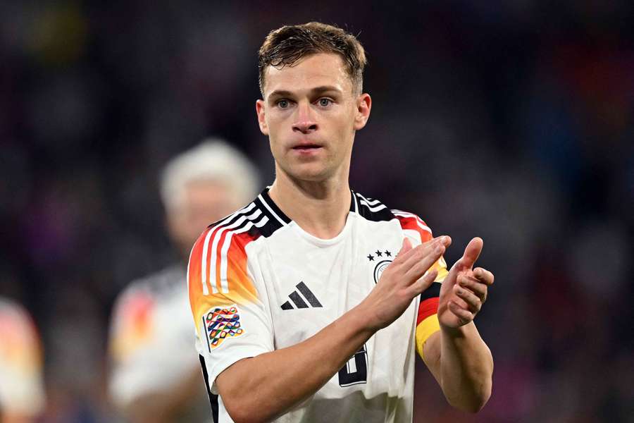 Germany's Joshua Kimmich applauding fans