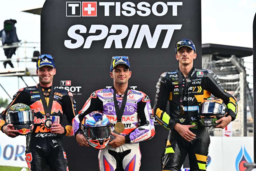 Martin (C) tops the podium after the sprint race