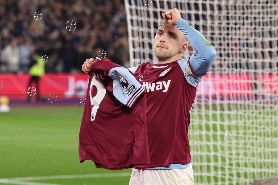 Jarrod Bowen of West Ham United celebrates to make it 2-1 while showing support for teammate Michail Antonio