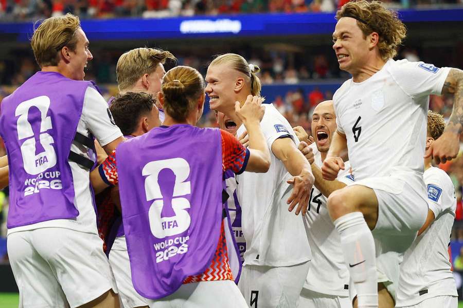 Erling Haaland celebrates scoring Norway's second goal with teammates Erling Haaland celebrates scoring Norway's second goal with teammates