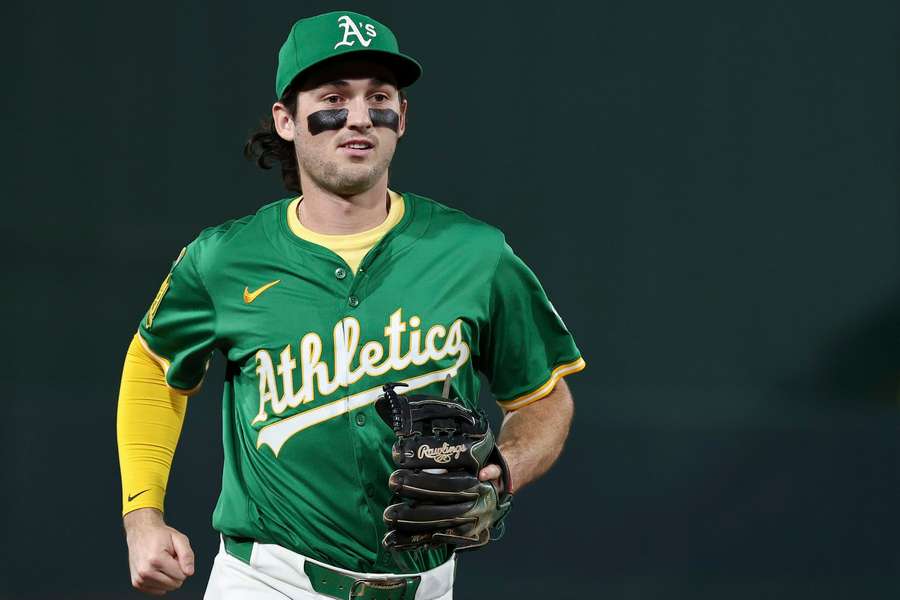 Athletics shortstop Jacob Wilson jogs to the dugout during a game Athletics shortstop Jacob Wilson jogs to the dugout during a game