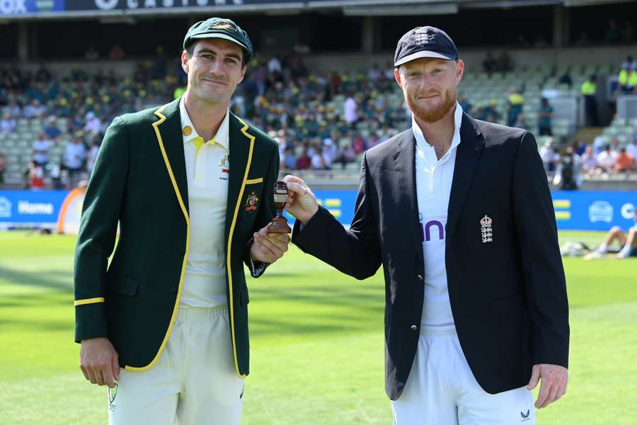 Team captains Pat Cummins and Ben Stokes pose for a photo with the replica Ashes Urn prior to play on the opening day
