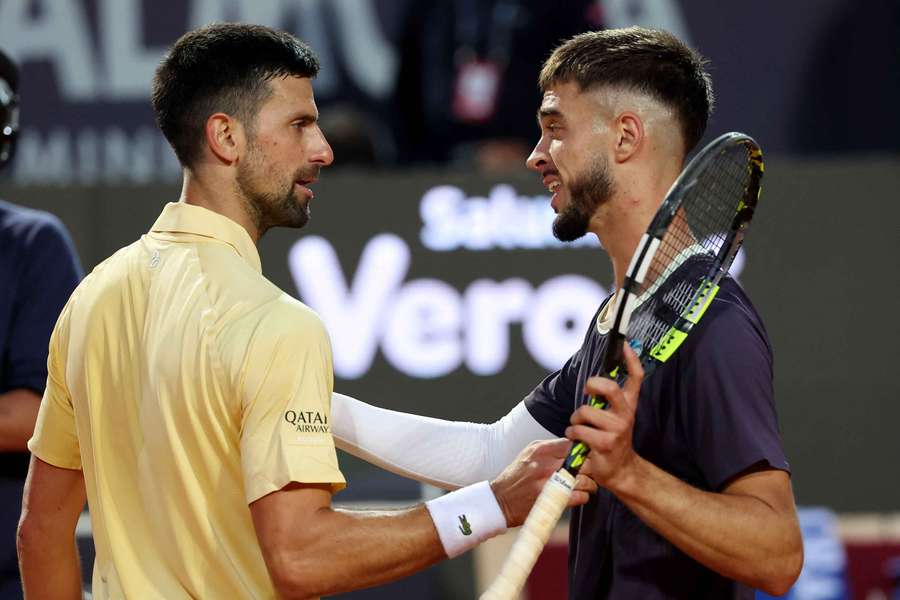Dino Prizmic with Novak Djokovic after winning his second round match