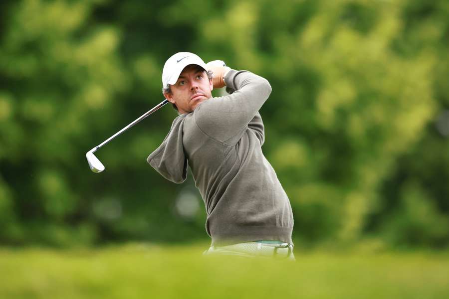 Rory McIlroy of Northern Ireland hits his first shot