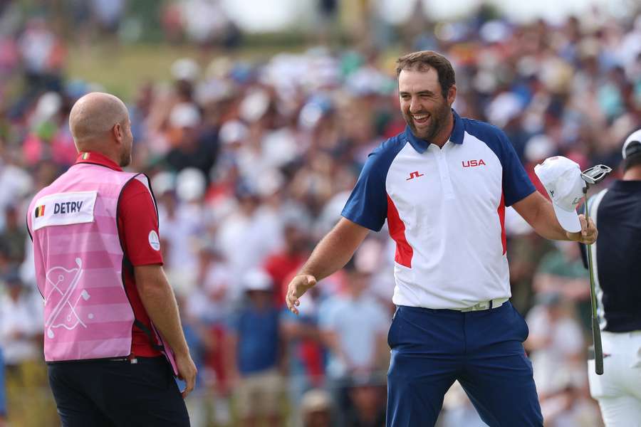 Scheffler celebrates after winning gold