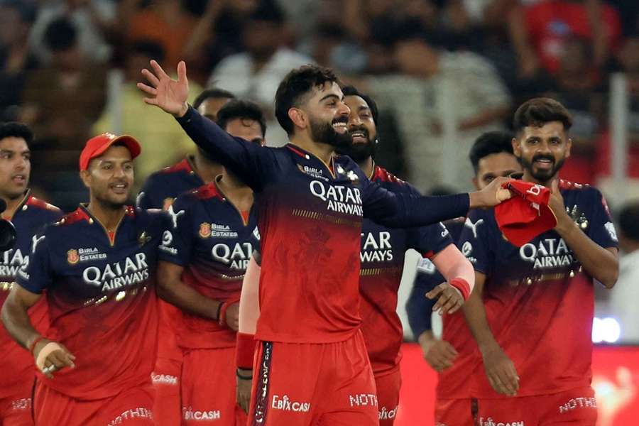 Royal Challengers Bengaluru's Virat Kohli celebrates with teammates after winning the Indian Premier League Royal Challengers Bengaluru's Virat Kohli celebrates with teammates after winning the Indian Premier League