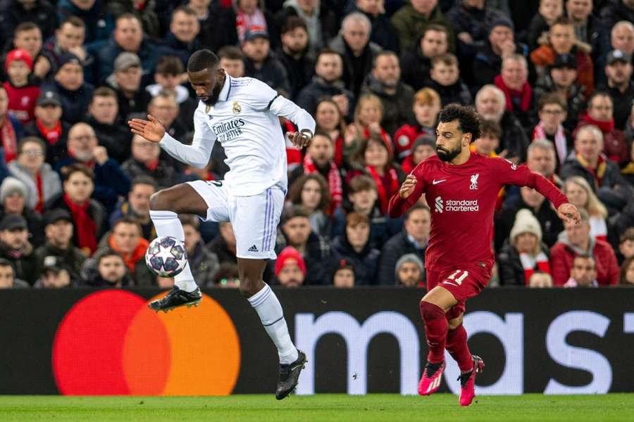 Rudiger controls the ball under the watchful eye of Salah.