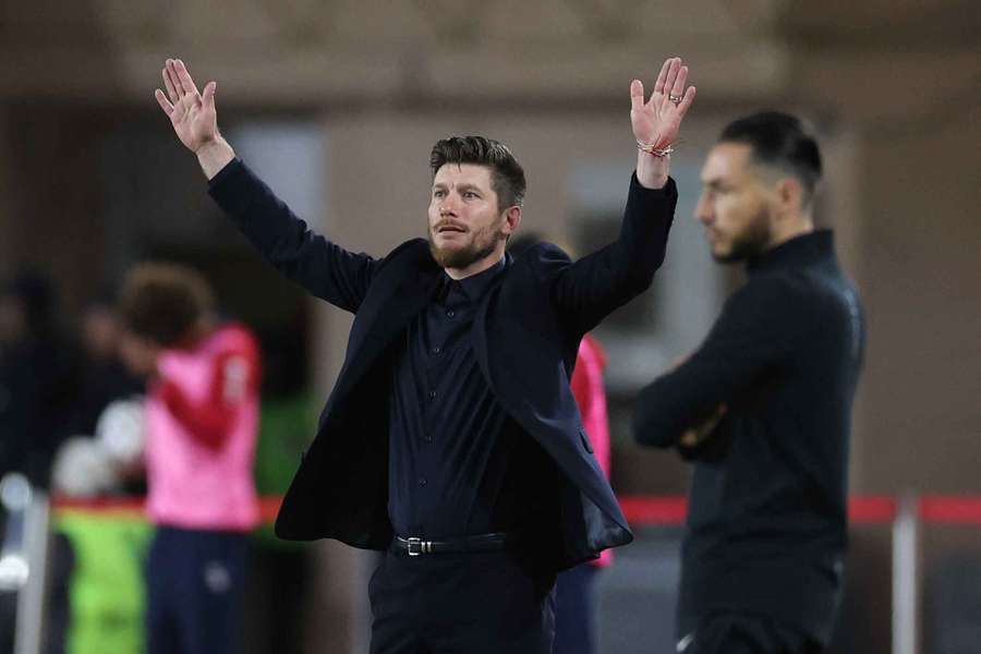 Pocognoli reacts on the touchline