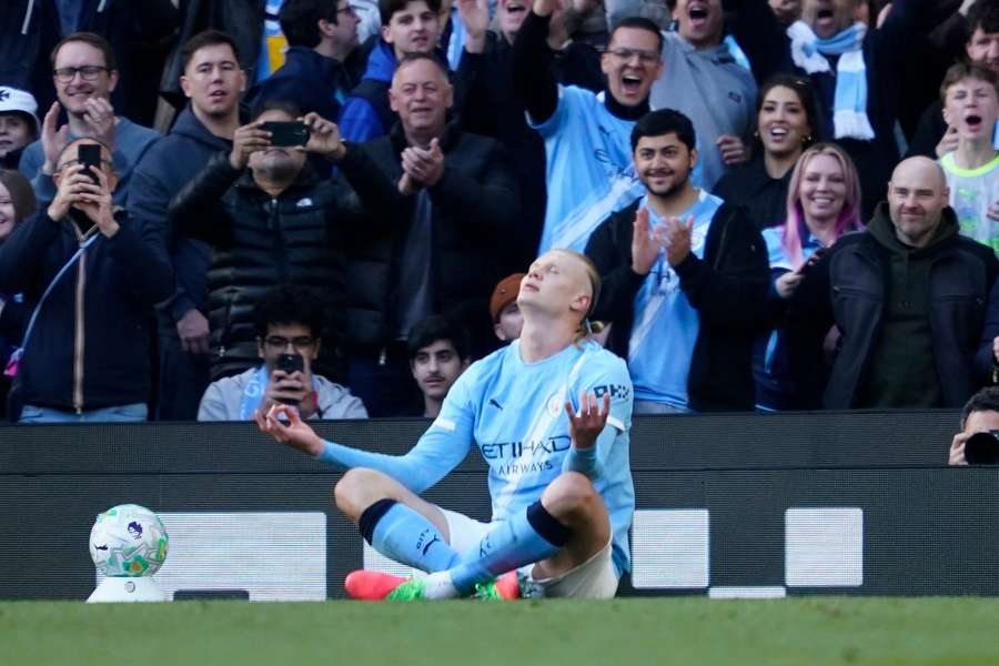 Manchester City's Erling Haaland celebrates after scoring against Arsenal
