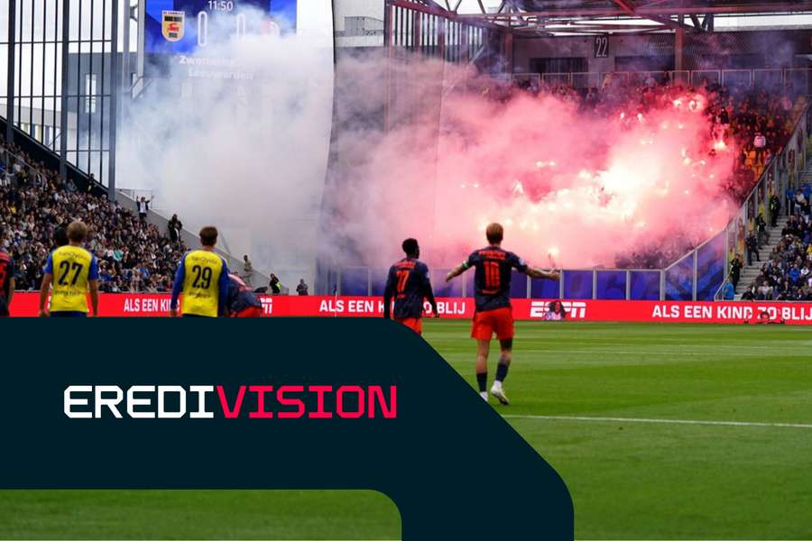 Feyenoord fans set off fireworks during the match against Cambuur