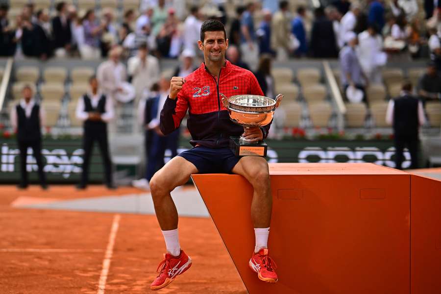 Novak Djokovic celebrates winning the 2023 French Open