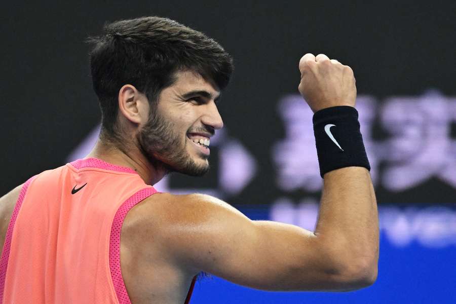 Spain's Carlos Alcaraz celebrates during the men's singles final against Italy's Jannik Sinner at the China Open