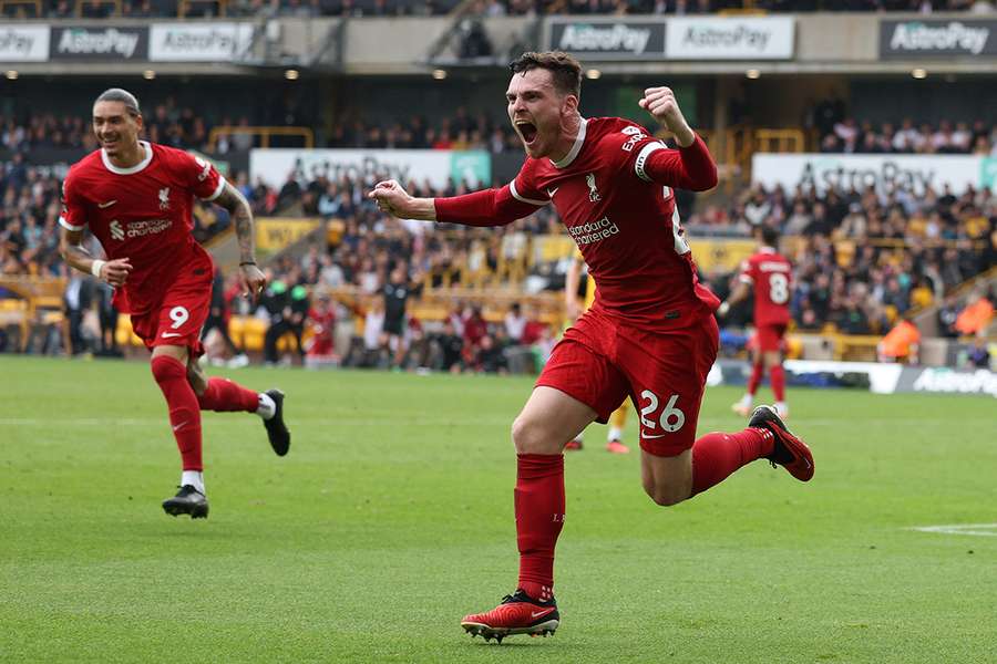 Robertson celebrates scoring for Liverpool