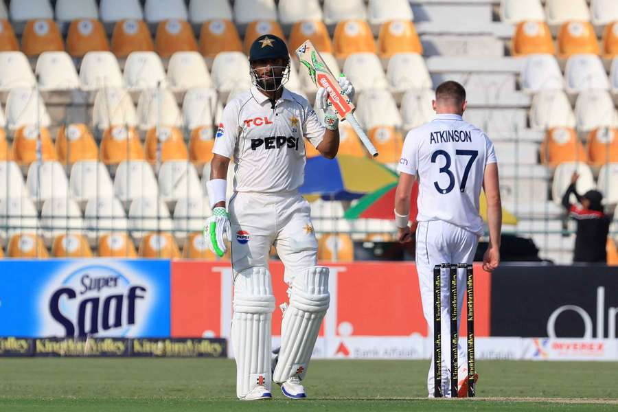 Shan Masood celebrates after scoring 150 runs