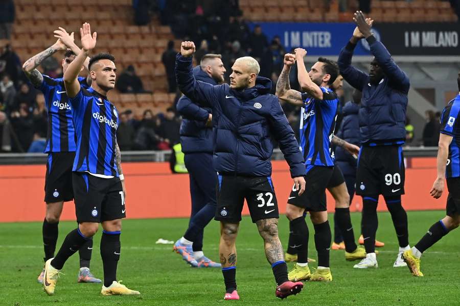 The Inter players celebrate after their 3-1 win against Udinese