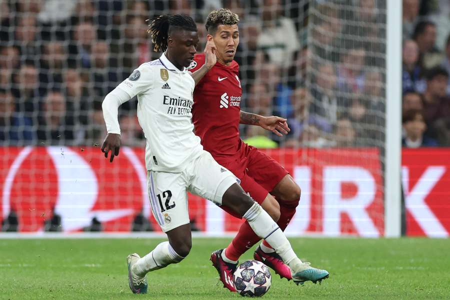 Eduardo Camavinga vies with Roberto Firmino