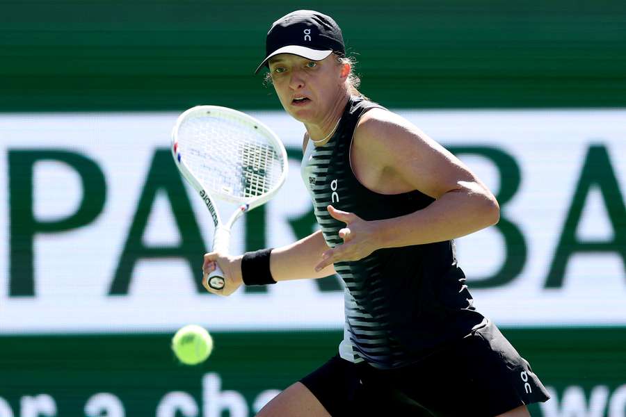 Iga Swiatek hits a forehand during her win at Indian Wells.
