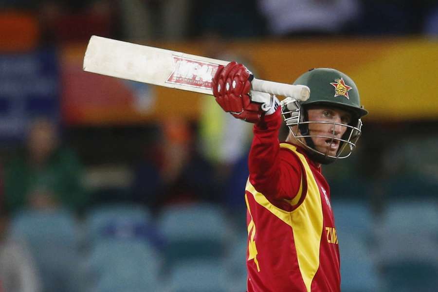 Zimbabwe's batsman Sean Williams acknowledges his 50 runs during his World Cup Cricket match