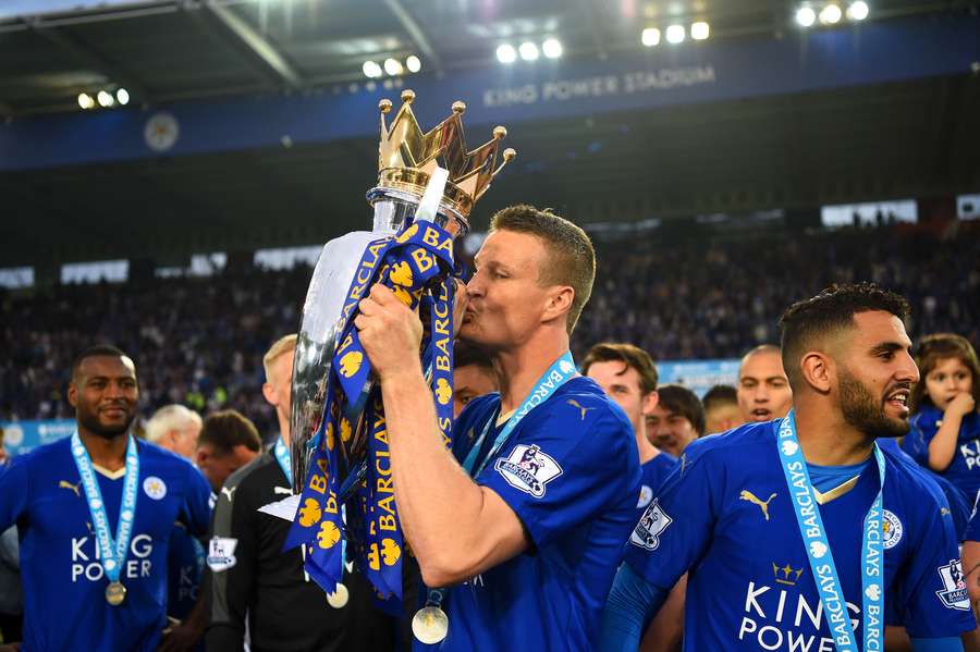 Robert Huth lifts the Premier League trophy Robert Huth lifts the Premier League trophy
