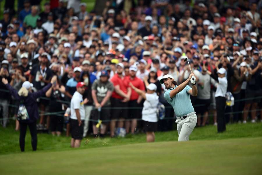 Tommy Fleetwood of England chips on the 18th hole in regulation during the final round Tommy Fleetwood of England chips on the 18th hole in regulation during the final round