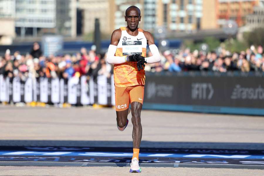 Eliud Kipchoge crosses the finish line after the Sydney Marathon