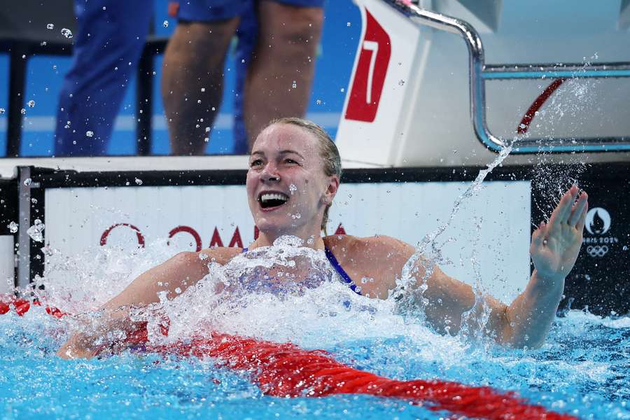 Sarah Sjoestroem of Team Sweden celebrates after winning gold