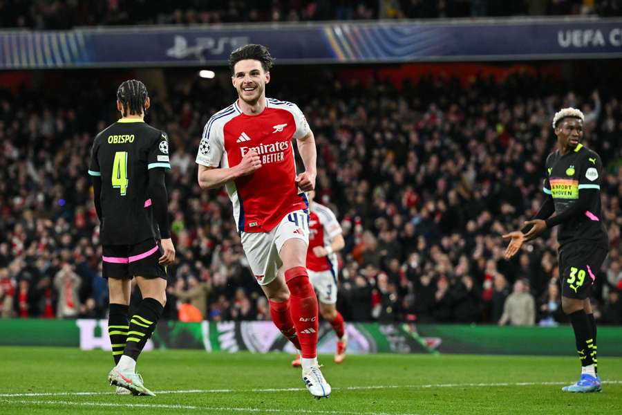 Declan Rice celebrates after scoring Arsenal's second goal against PSV