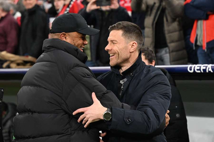 Vincent Kompany (l.) und Xabi Alonso (r.)