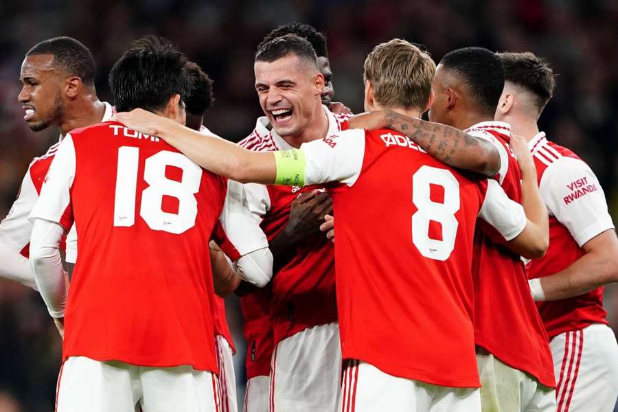 Granit Xhaka celebrates with teammates after putting Arsenal 1-0 up.