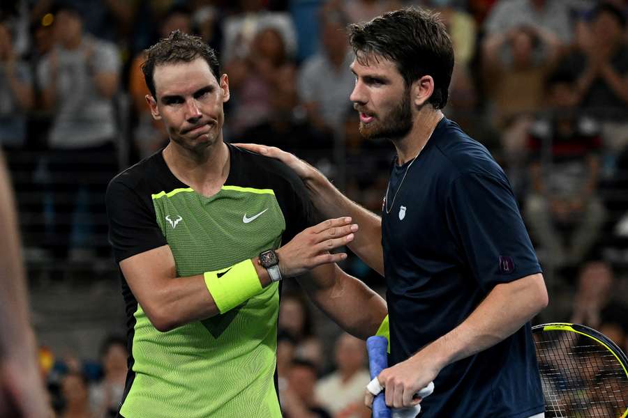 Rafael Nadal (L) lost his opening match at the United Cup to Cameron Norrie 