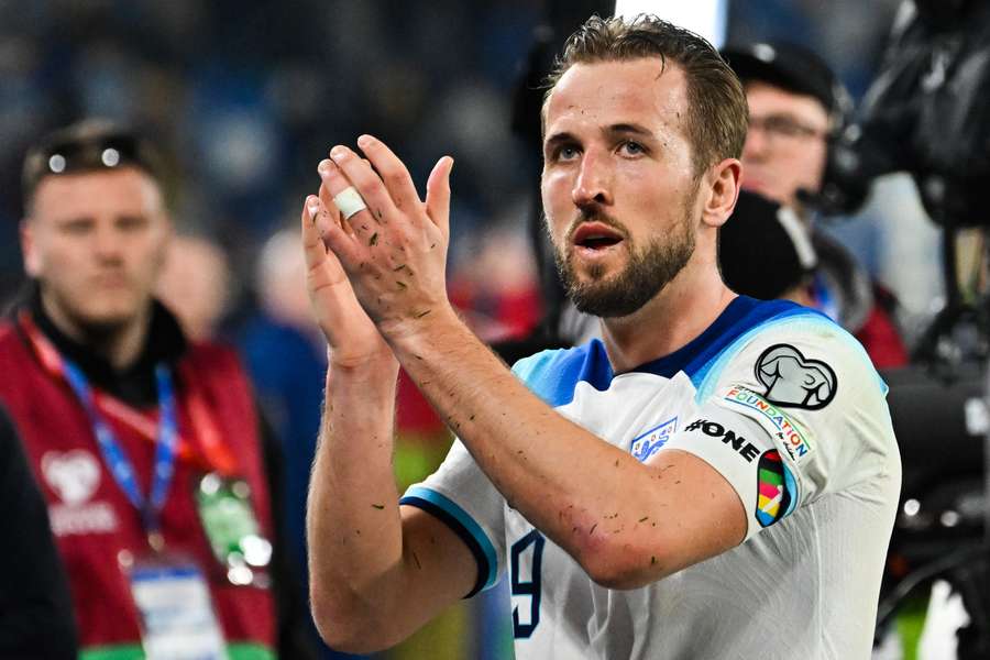 Harry Kane applauds supporters after leading England to beat Italy in Naples