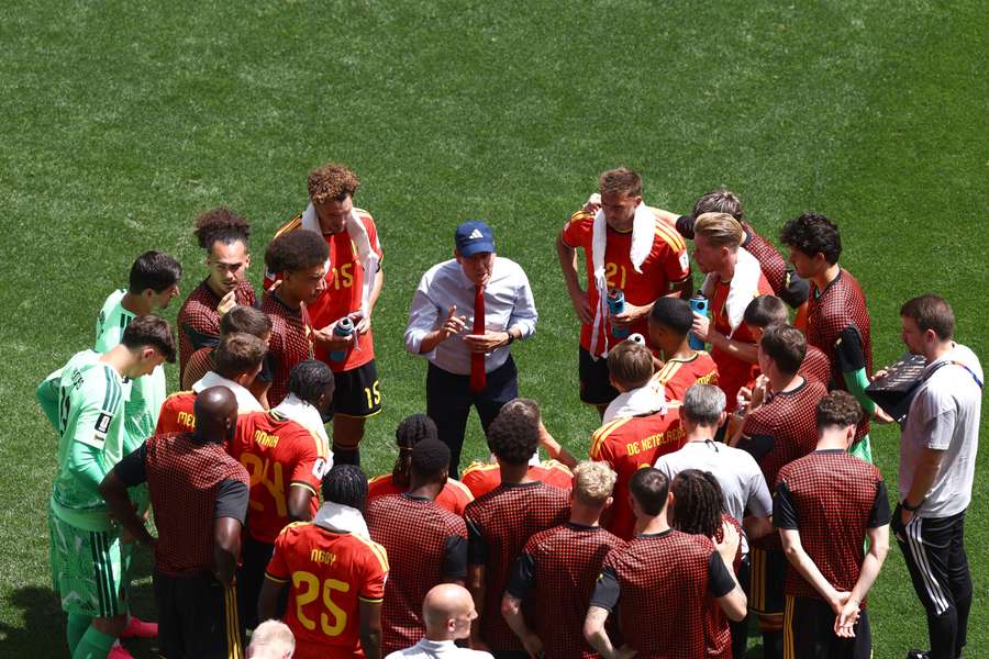 Rudi Garcia speaks to his players during a water break Rudi Garcia speaks to his players during a water break