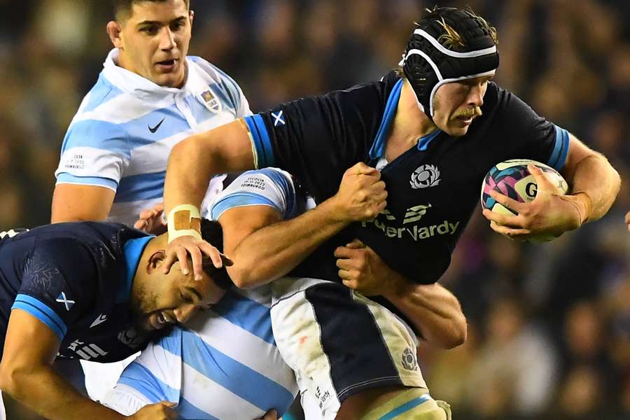 Scotland's lock Jonny Gray powers through Argentina.