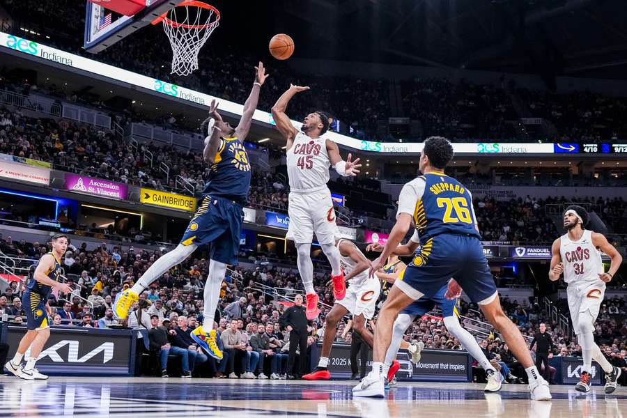 Cleveland Cavaliers guard Donovan Mitchell goes up for a shot against Indiana Pacers forward Pascal Siakam