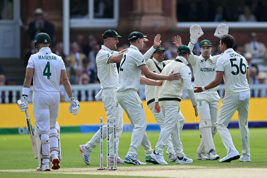 Australia celebrate after South African opener Aiden Markram was removed for a duck
